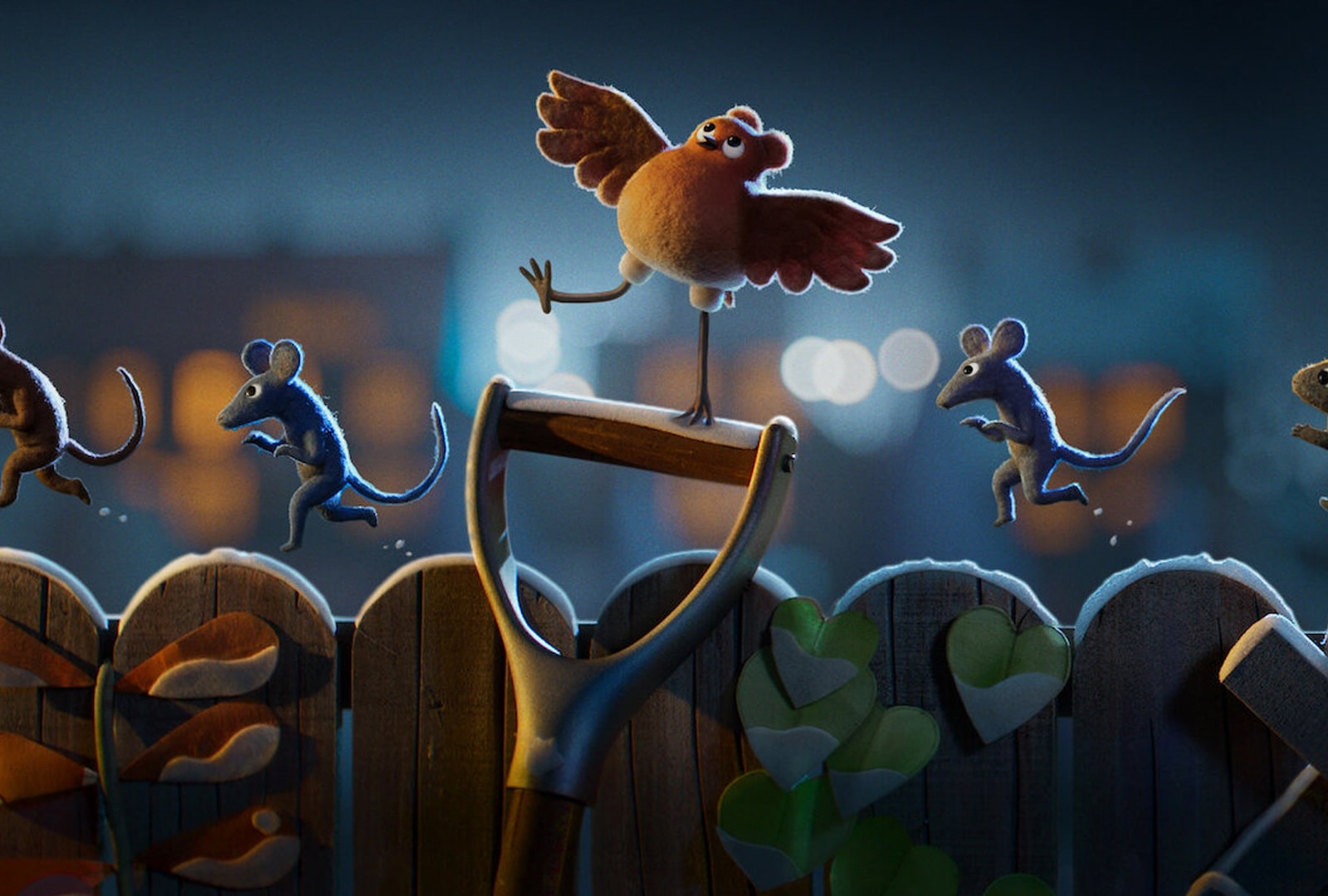 Still from the Netflix movie Robin, Robin with characters walking along a fence