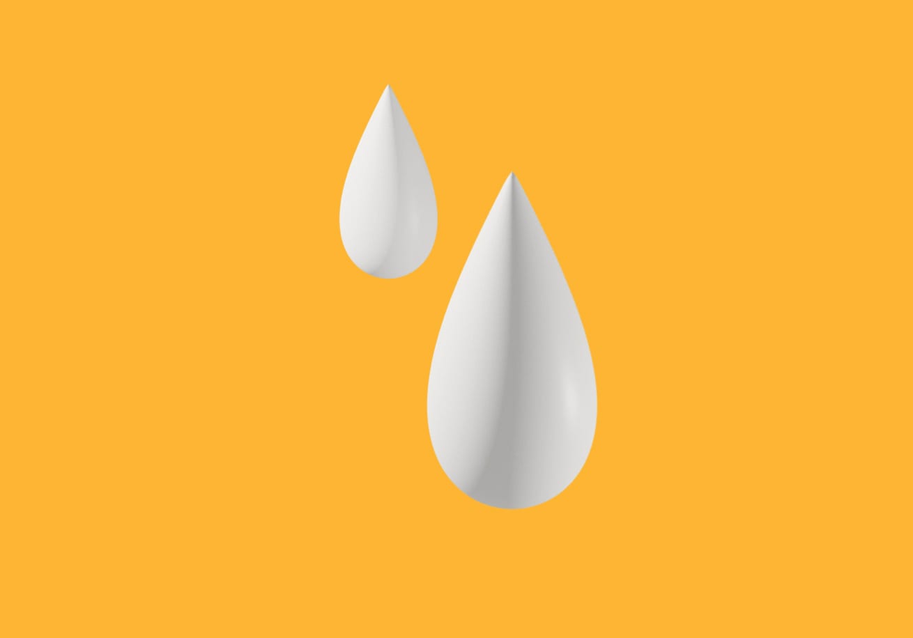 3D illustrated drops of milk on yellow background